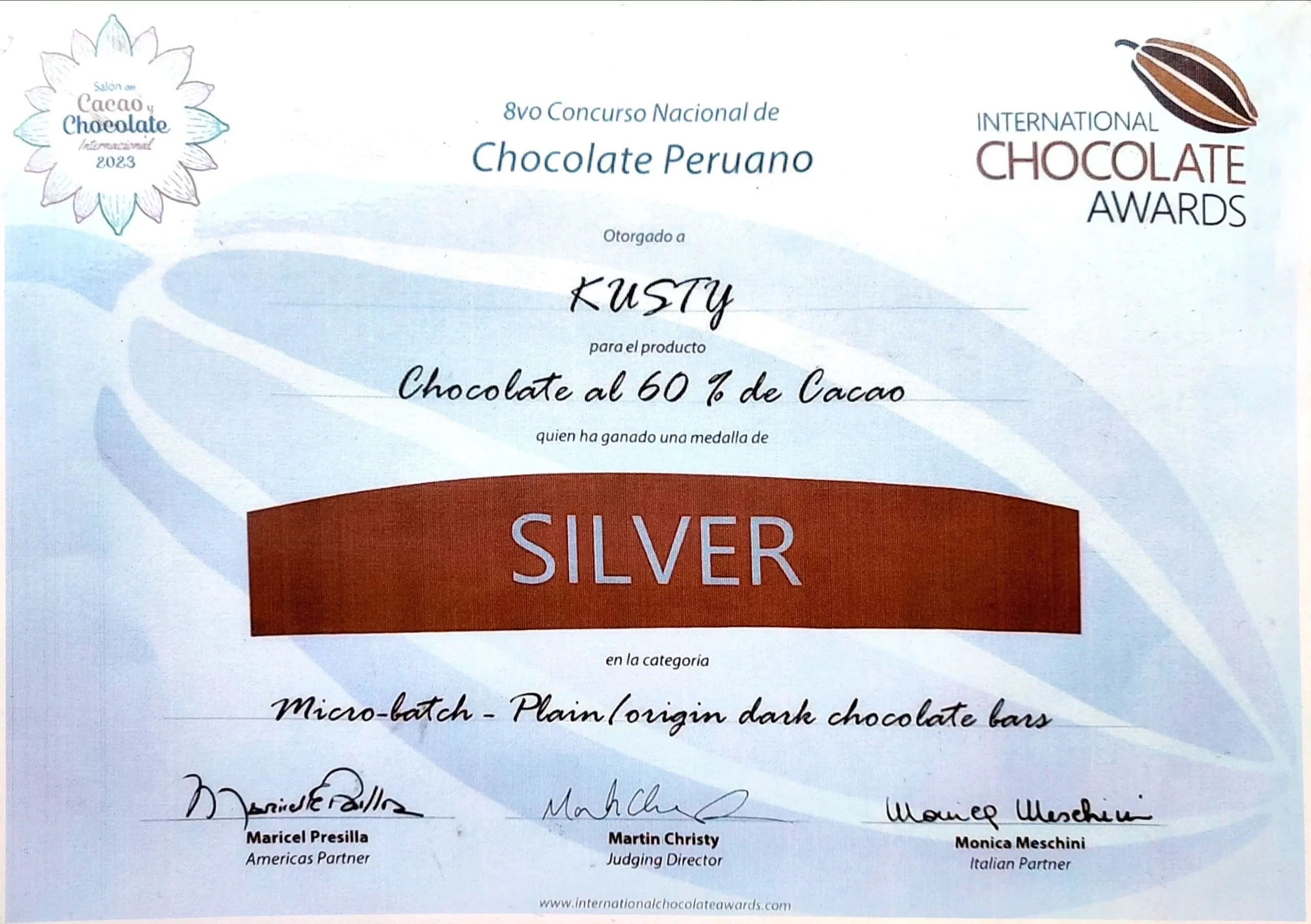 Diploma Kusty Salón de Caao y chocolate Diploma, medalla deplata Kusty